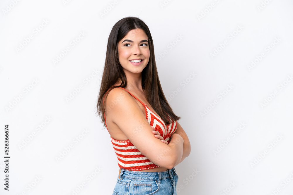 Young Brazilian woman isolated on white background with arms crossed and happy Young Brazilian woman isolated on white background with arms crossed and happy