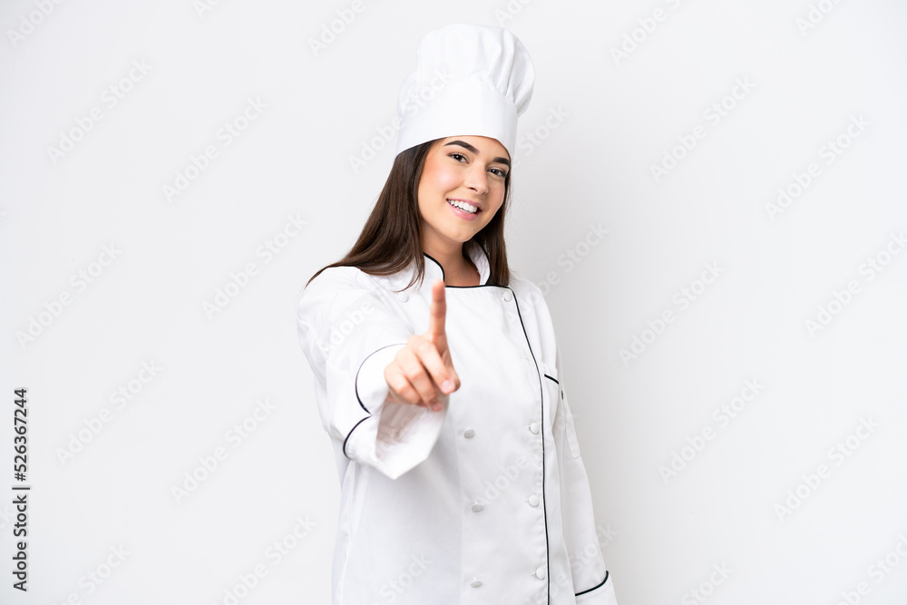 Young Brazilian chef woman isolated on white background showing and lifting a finger Young Brazilian chef woman isolated on white background showing and lifting a finger