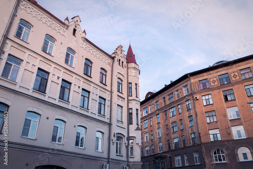 Facades of building on a street of Vyborg by summer day