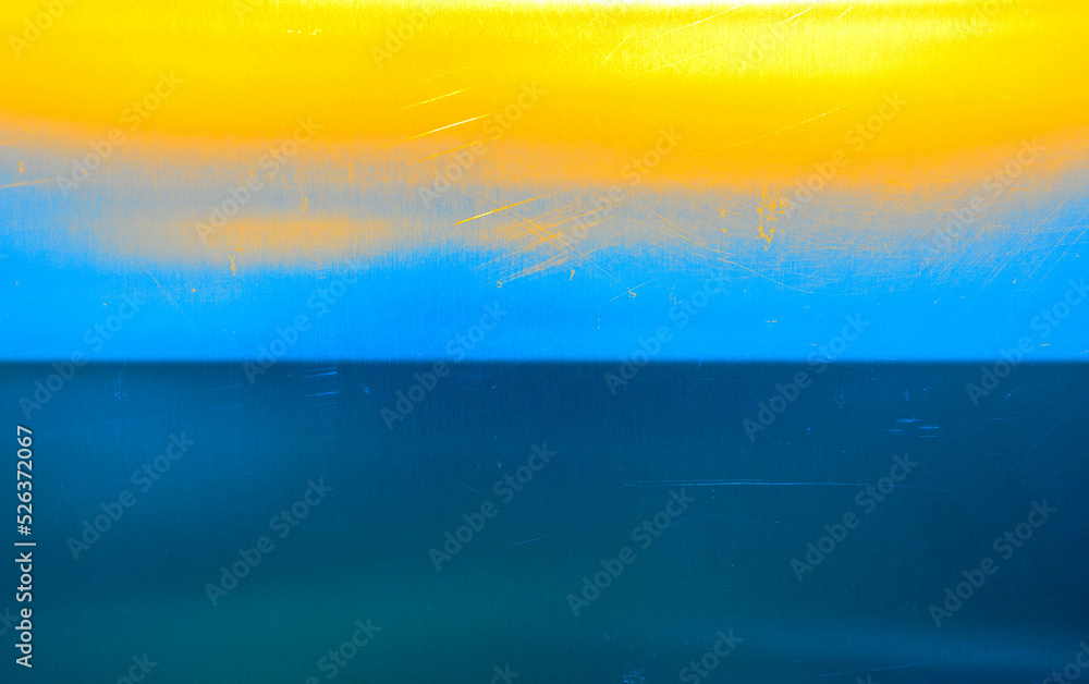 off focus abstract background blue and yellow colors like a sunset on the sea