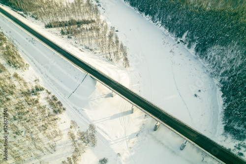 aerial view of bridge in winter time, perspective view of bridge and road with cars