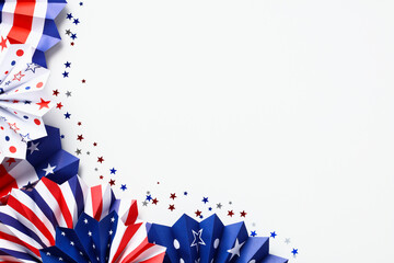 USA National holiday banner design. Red white and blue paper fans with confetti on white table. Flat lay, top view. Happy American Independence Day, Labor Day, Columbus Day concept