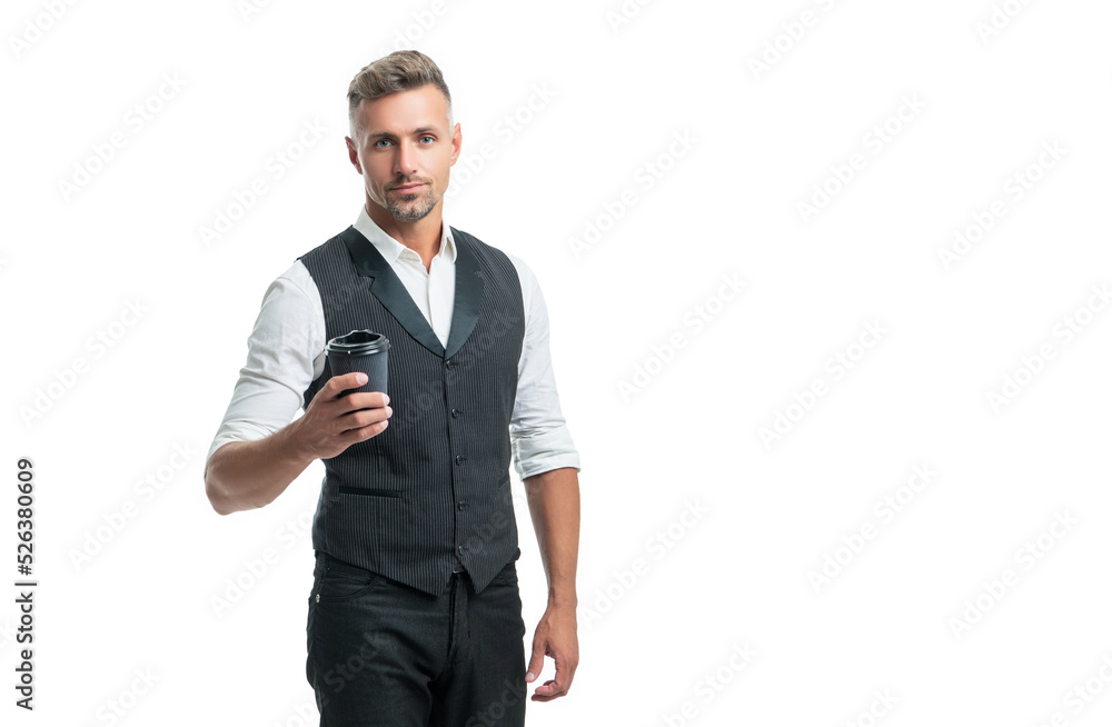 Serious professional man in suit vest holding disposable cup with takeaway coffee isolated on white Serious professional man in suit vest holding disposable cup with takeaway coffee isolated on white