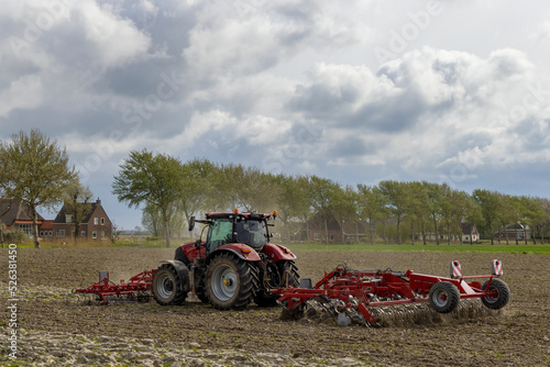 Tractor during spring work on the field
