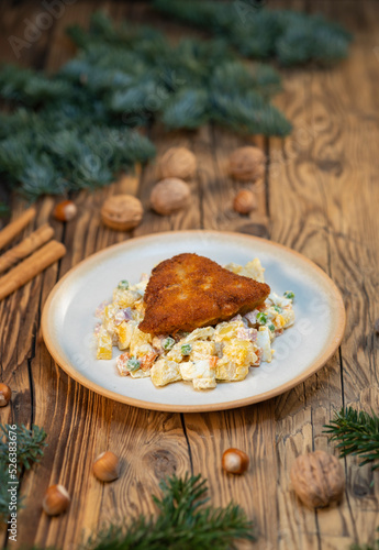 Traditional Christmas dinner in Czech Republic - carp fillet with potato salad