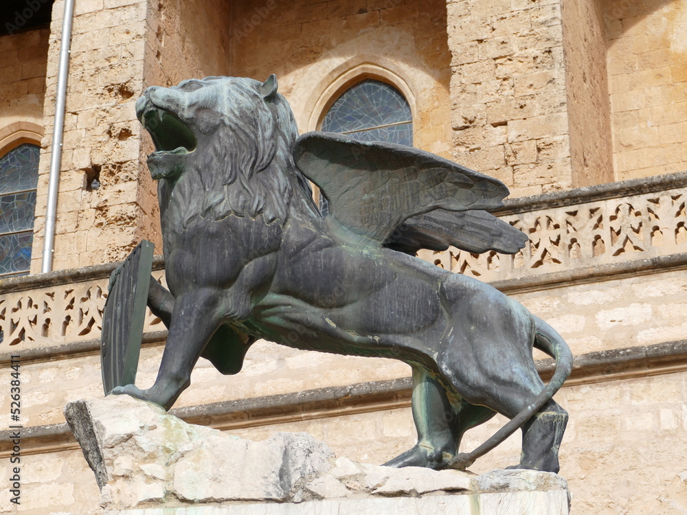 Winged lion in front of the parish church of Nuestra Senyora de los Angeles in Sineu, Mallorca, Balearic Islands, Spain
