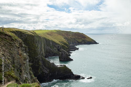 View of cliffs in Old Head of Kinsale peninsula, County Cork, Ireland photo