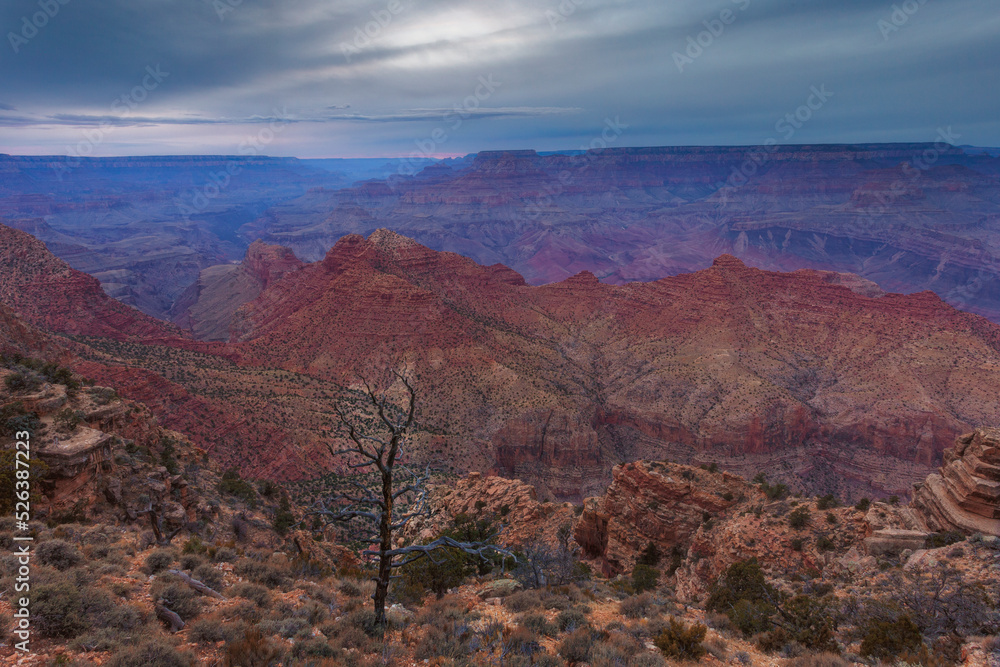 Overcast skies over the Grand Canyon at dusk