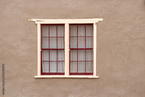 A painted window on the exterior of a building