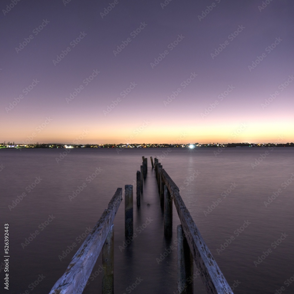 Fototapeta premium Old pier at sunset