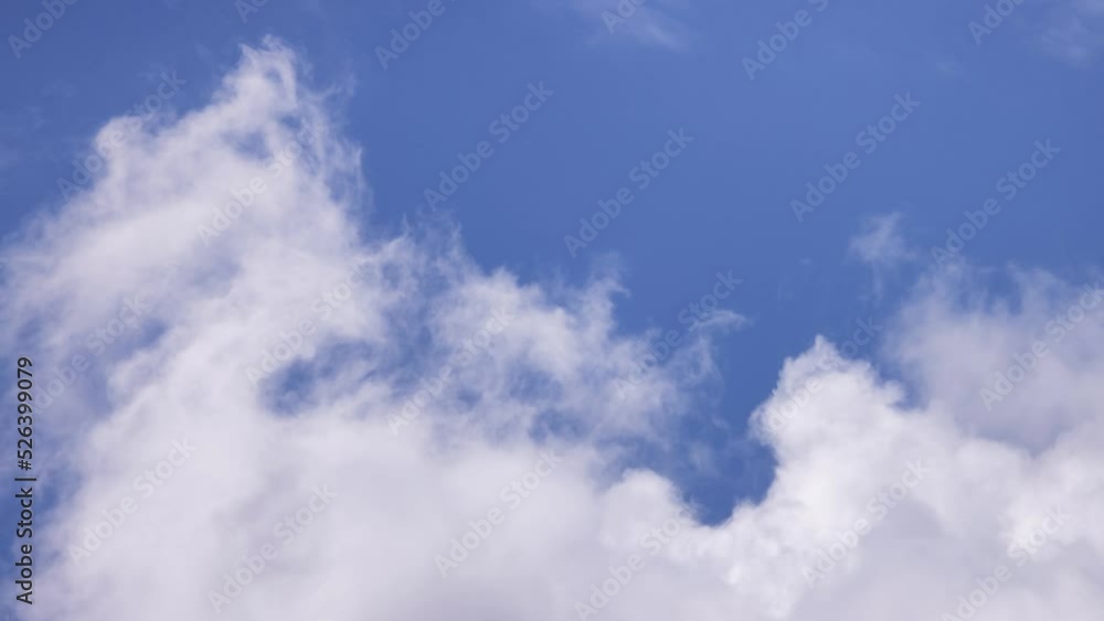 Cinemagraph Continuous Loop. View of Cloudscape during a cloudy blue sky sunny day. Taken on the West Coast of British Columbia, Canada. Cinemagraph Continuous Loop. View of Cloudscape during a cloudy blue sky sunny day. Taken on the West Coast of British Columbia, Canada.