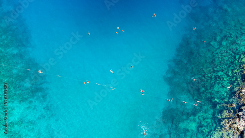 Aerial view of a crowded beach, umbrellas and people on the sand stock photo - Antalya, Kaş