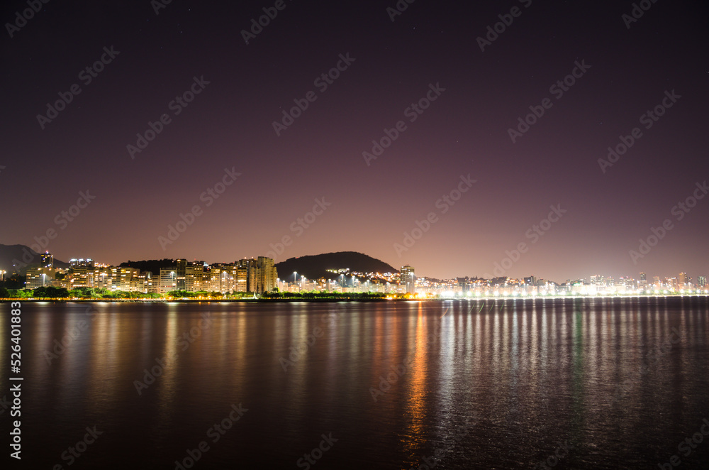 Night view of the bay in a long exposure photo at Miami, State of Slorida, USA.