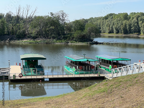 Tourist boats in the nature park Kopacki rit - Kopacevo, Croatia (Turistički brodovi u parku prirode Kopački rit, Kopačevo - Baranja, Hrvatska) photo