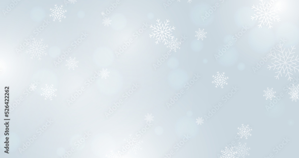 Falling snowflakes on soft blue background. Christmas and New year