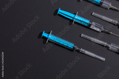 Disposable plastic syringe prepared for injection and vaccination in the hospital. The concept of medicine and health