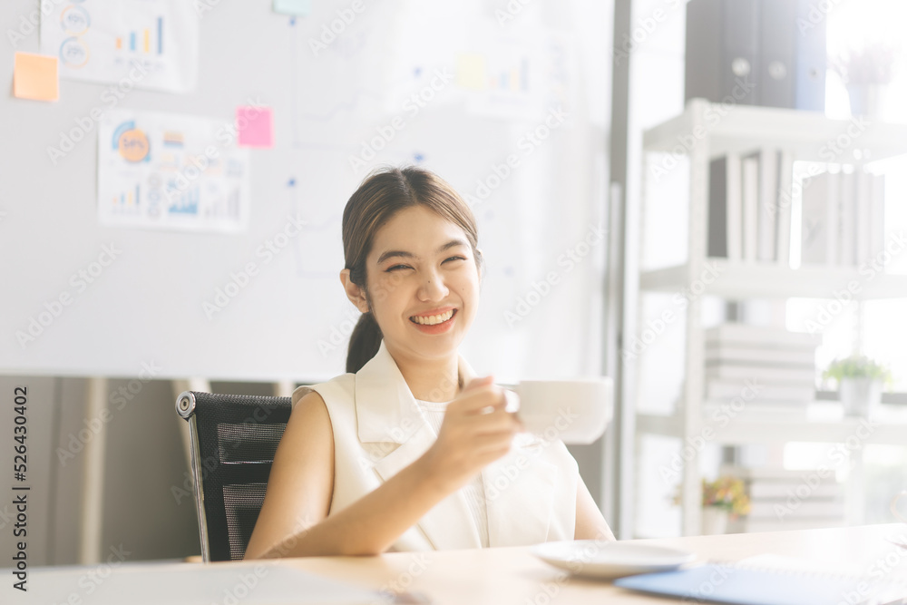 Portrait of young adult southeast business asian woman with blur coffee cup good in morning Portrait of young adult southeast business asian woman with blur coffee cup good in morning