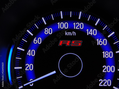 speedometer on black background