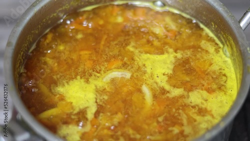 home cooked marmalade bubbling in a pot 