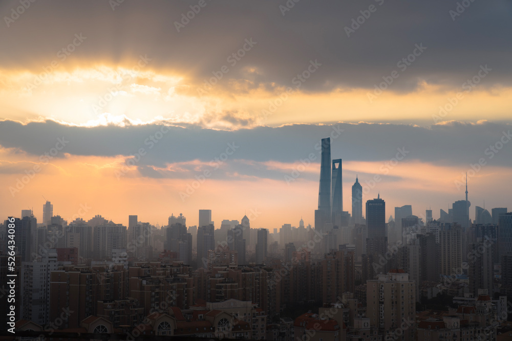 sunset over the downtown area of shanghai city