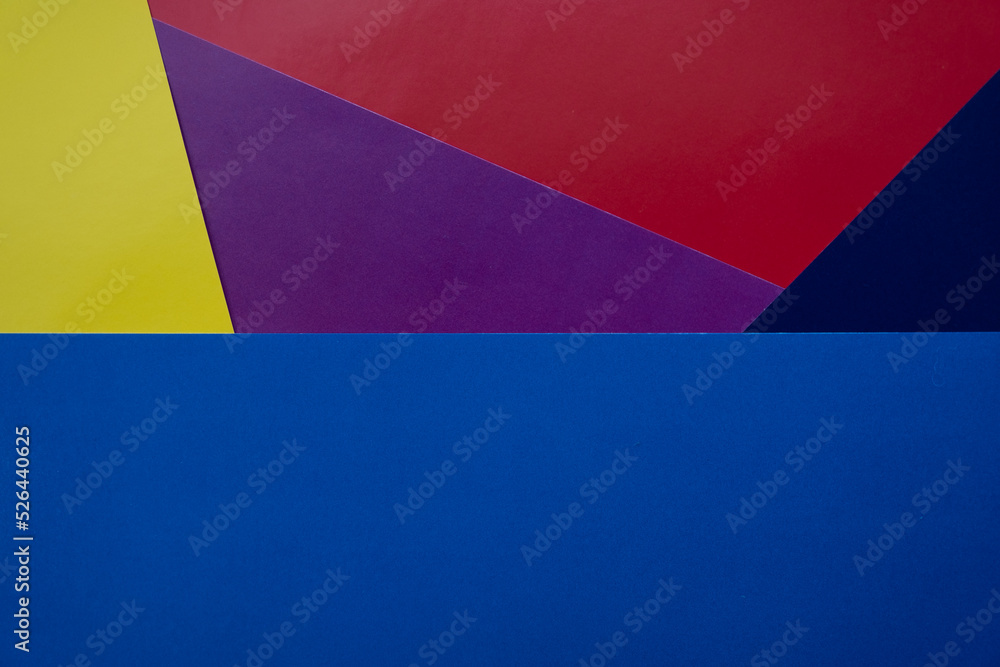 Abstract paper is a colorful background, a creative design for pastel wallpaper. Yellow, red, purple, blue colors. Abstract paper is a colorful background, a creative design for pastel wallpaper. Yellow, red, purple, blue colors.