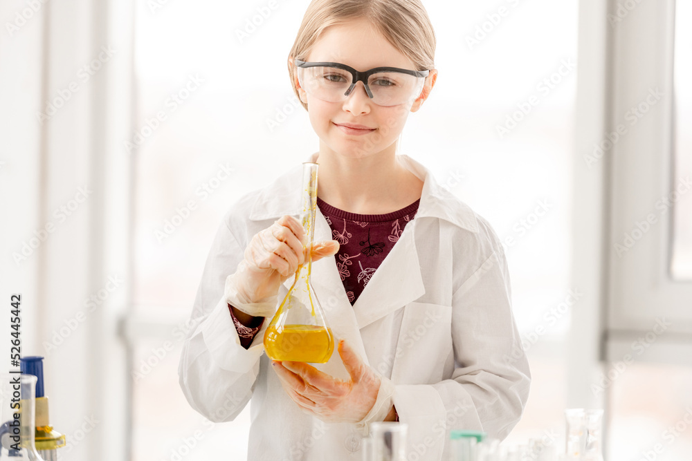 Girl on chemistry lesson Girl on chemistry lesson