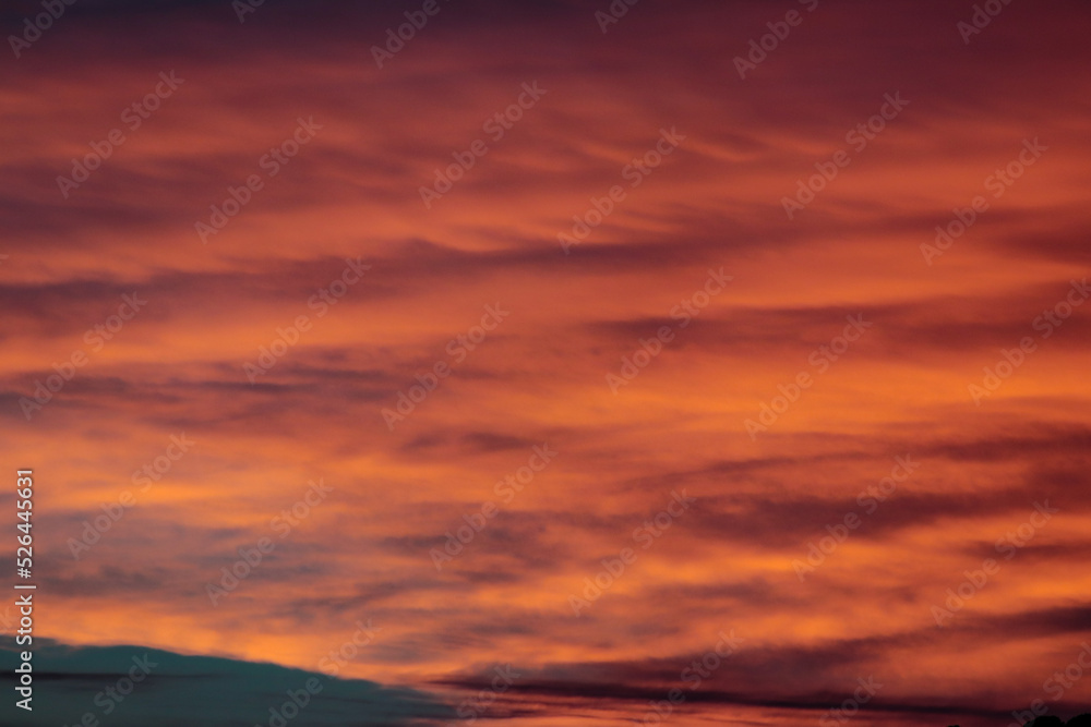 cloudy sunset with orange and pink clouds