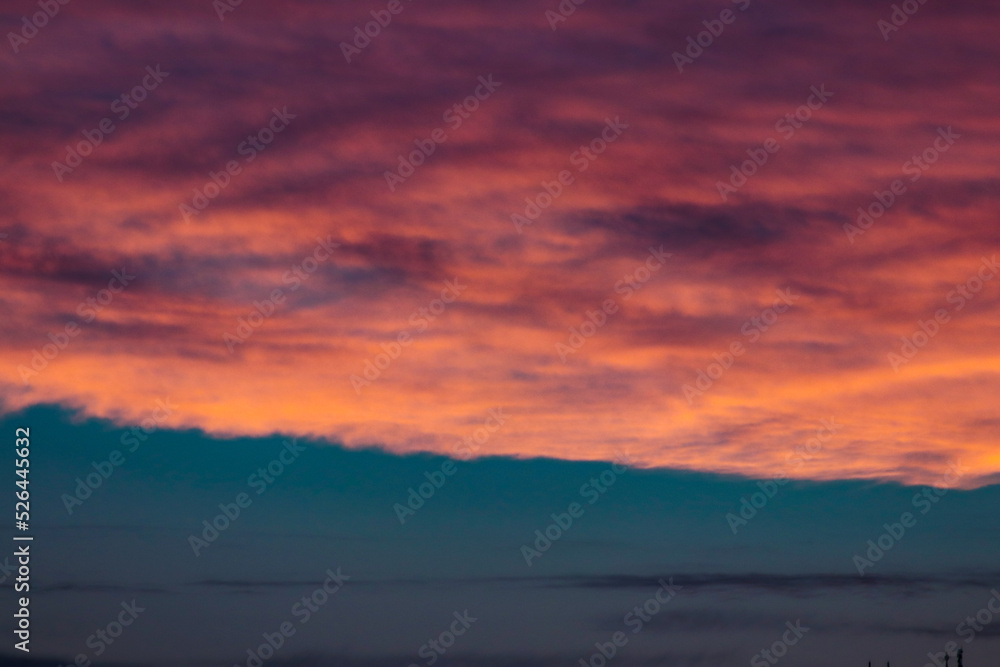cloudy sunset with orange and pink clouds