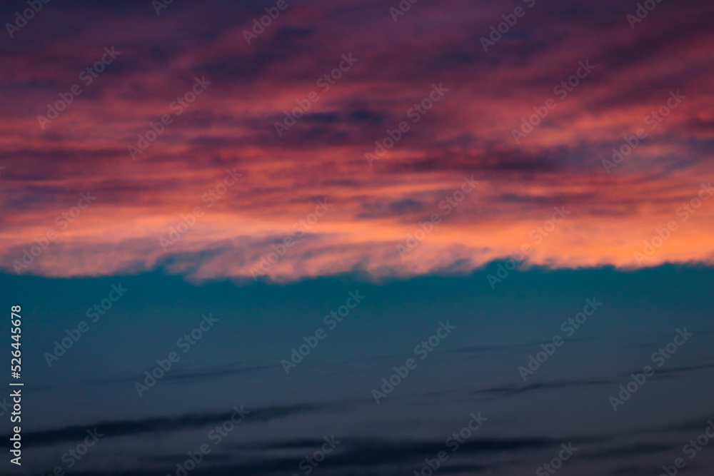 cloudy sunset with orange and pink clouds