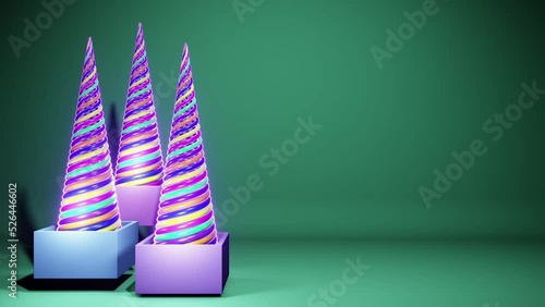 Three randomly appearing swirling colorful trees from boxes on a green backround photo