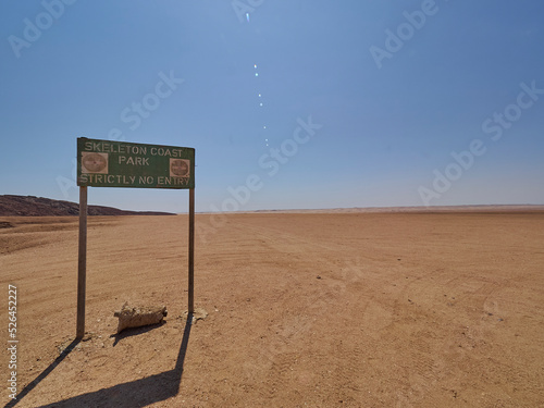Obraz na płótnie Gravel road through the arid region of the Kaokoveld Namibia