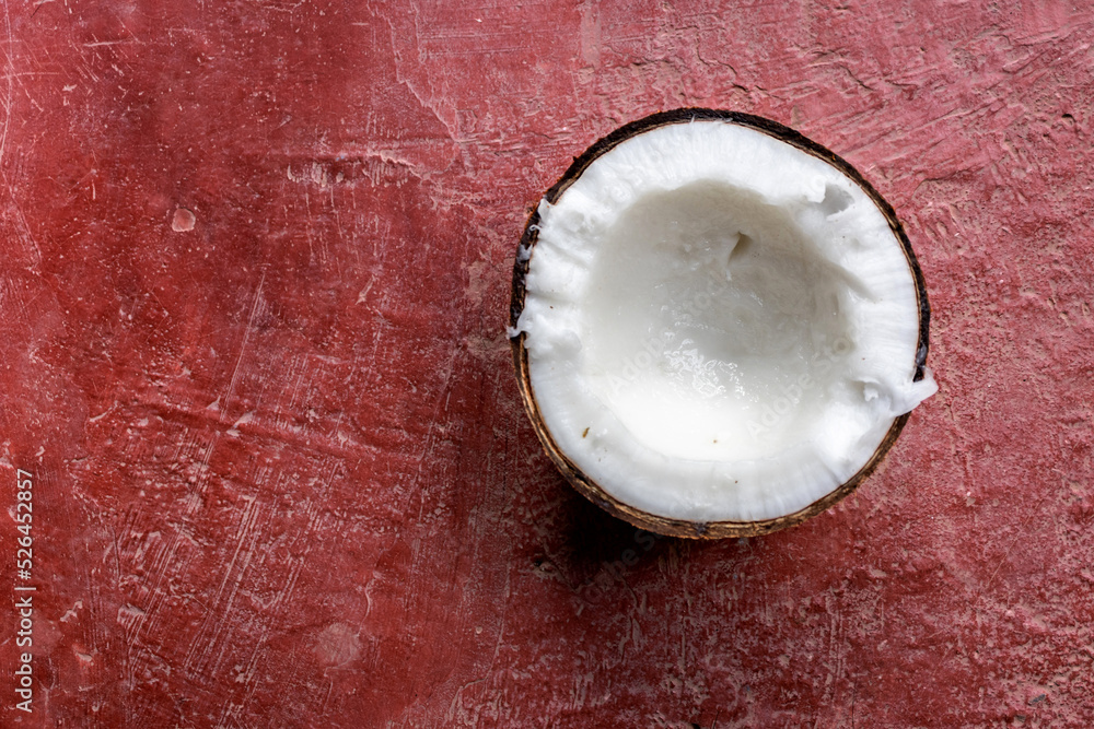 Coconut ripe Coconut ripe for food ingredient on red cement floor Coconut ripe Coconut ripe for food ingredient on red cement floor