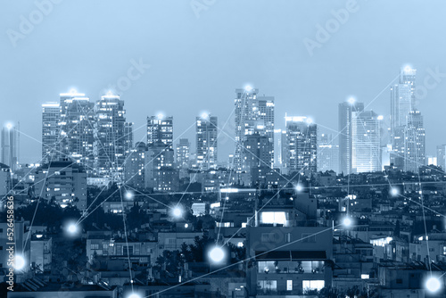 Network concept 5G smart city on blue background. Modern city with wireless network connection concept. Blue tone city scape and network connection concept