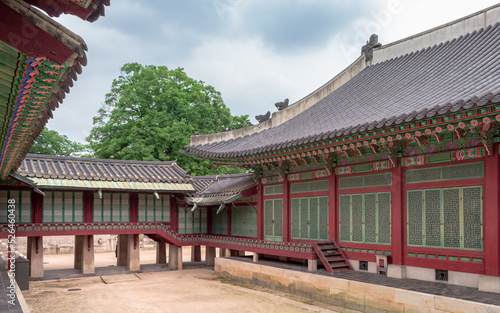 Colorful traditional wood Korean architecture temple building complex Changgyeonggung Palace in Seoul South Korea