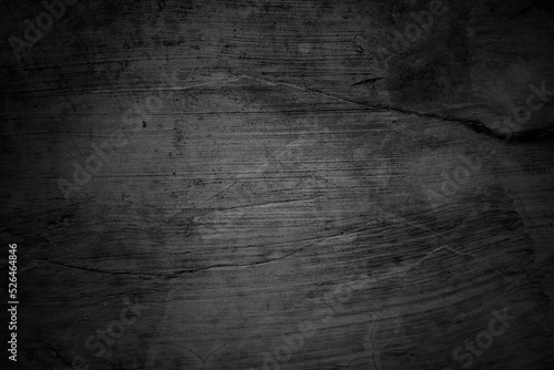 Cracked walls dark gray concrete, concrete floor is aged in a retro concept, Texture of a grungy black concrete wall as background.