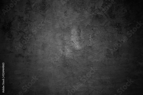 Cracked walls dark gray concrete, concrete floor is aged in a retro concept, Texture of a grungy black concrete wall as background.