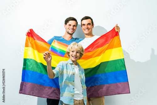 Lgbt family, gay couple with adopted son - LGBTQ rainbow family portrait at home