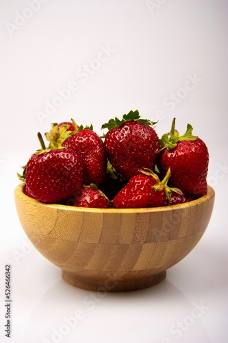 Organic strawberry on white background. Red fresh strawberry.