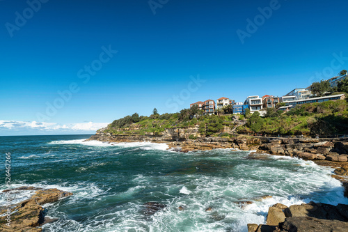 Bronte and Tamarama beach and ocean view from Bondi to Coogee coastal walk, Sydney, Australia - View of the sea, Bondi coastal and Bondi Beach on a summer's day in Sydney, Australia photo