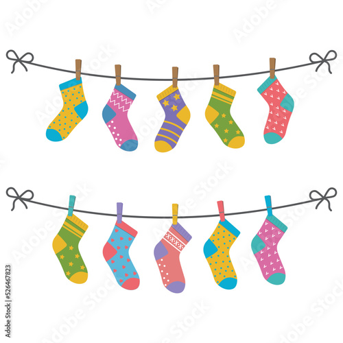 a set of children's socks are dried on a rope. flat vector illustration isolated on white background
