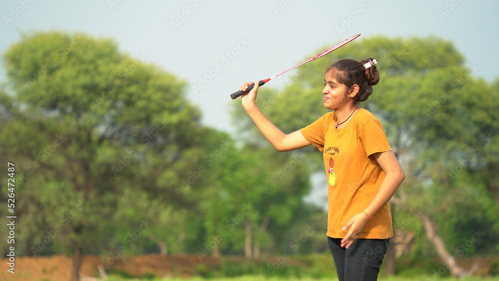 Beautiful female tennis player serving. Tennis player playing game on outdoor.  Athlete Asian woman hitting ball with racket during match panoramic header. on green background
