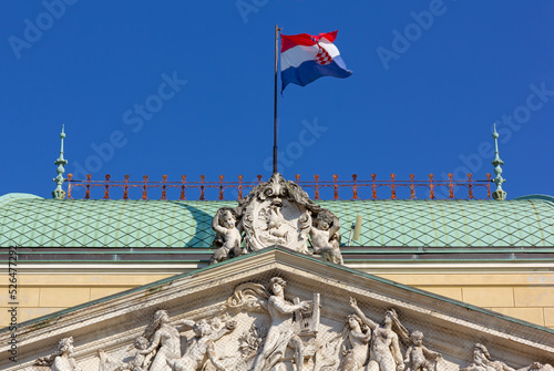 Croatian flag waving at the top of the Croatian National Theater in Rijeka