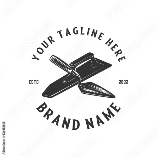 retro logo design bullder. the concept of a hand trowel as a symbol, for a construction or repair company.