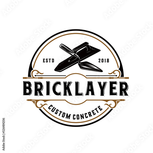 building vintage logo design. with a hand trowel concept in a vintage circle shape, perfect for construction companies