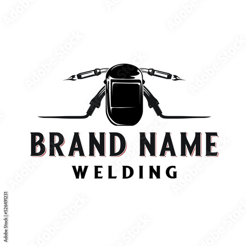 welding vintsge logo design logo. passing welding torch concept, for welding business
