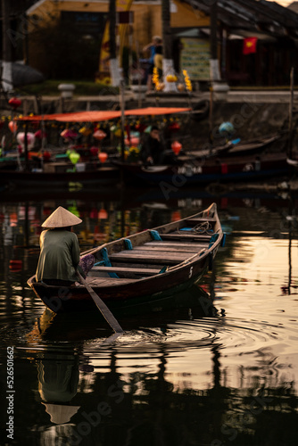 Silhouette of passenger boat, Hoi An, Vietnam.
