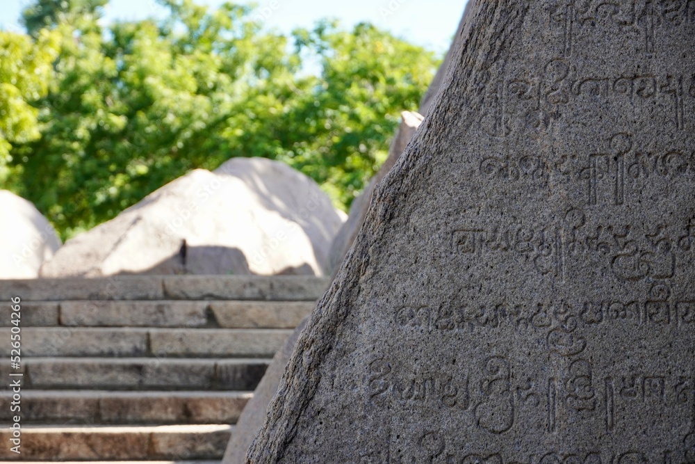 Inscriptions of tamil text on the walls of historical ancient temple in