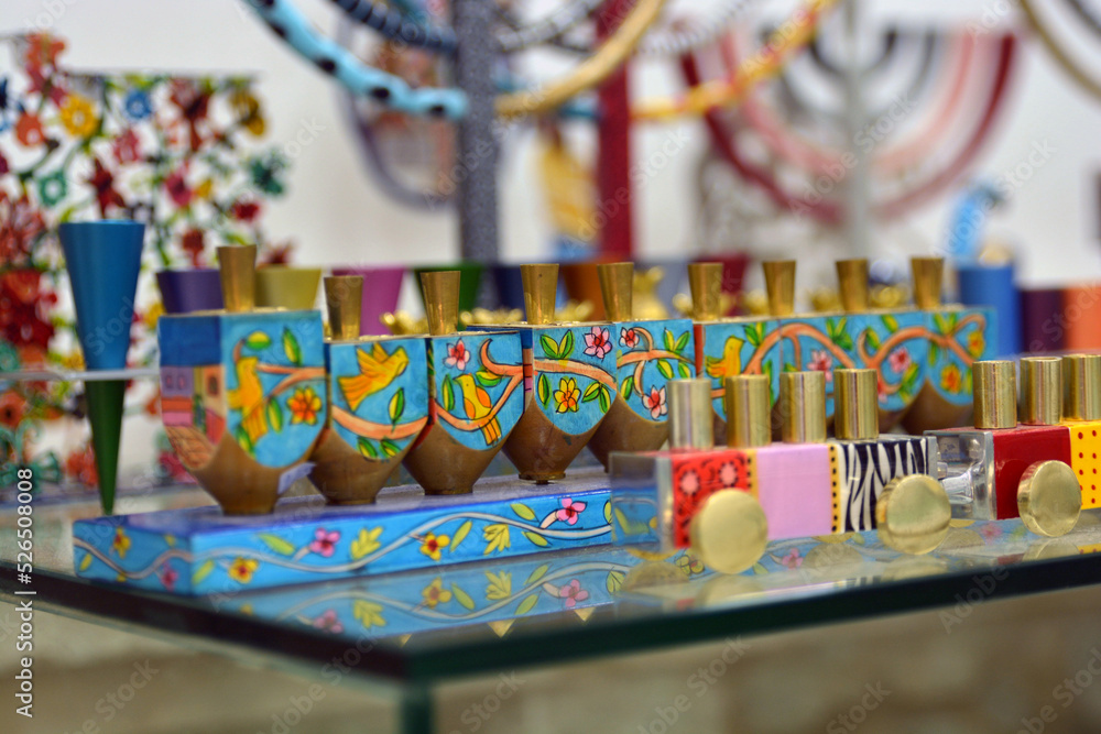 Spindles and menorahs in an alley on Safed Street in Israel. Presented to the public for public enjoyment
