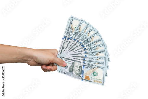 Female hand holding a stack of hundred-dollar cash bills isolated on a white background. Shopping, payment for purchases, banking operations. Money concept