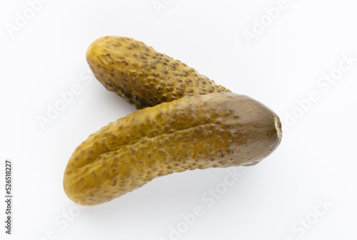 Pickled cucumbers isolated on white.